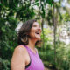 Mature woman looking around on the public park