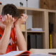 Teenager boy tired stressed of reading, doing homework